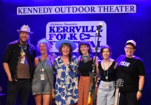 2025 Grassy Hill Kerrville New Folk Winners (l.-r.) are Martin Gilmore, Cindy Kalmenson, Sara Beth Go, Madeleine Roger, Abigayle Oakley, and Katie Dahl. (Photo from the Kerrville Folk Festival's Facebook page)