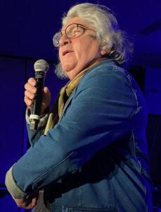 Gilles Garand served as emcee for the Folquebec Spotlight showcase at the New York Hilton Midtown. (iPhone Photo: Michael Kornfeld)