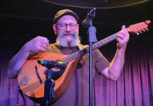 Sean Dagher performs during the roots music variety show. (iPhone Photo: Michael Kornfeld)